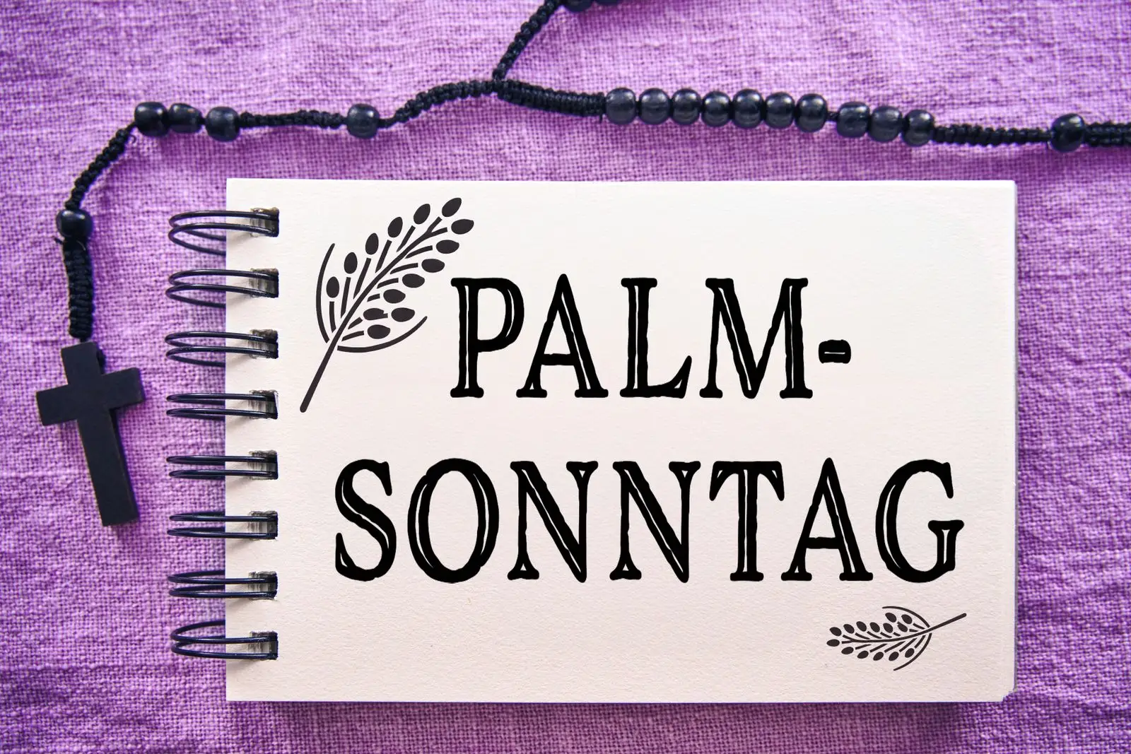 Kalender mit text palmsonntag und rosenkranz